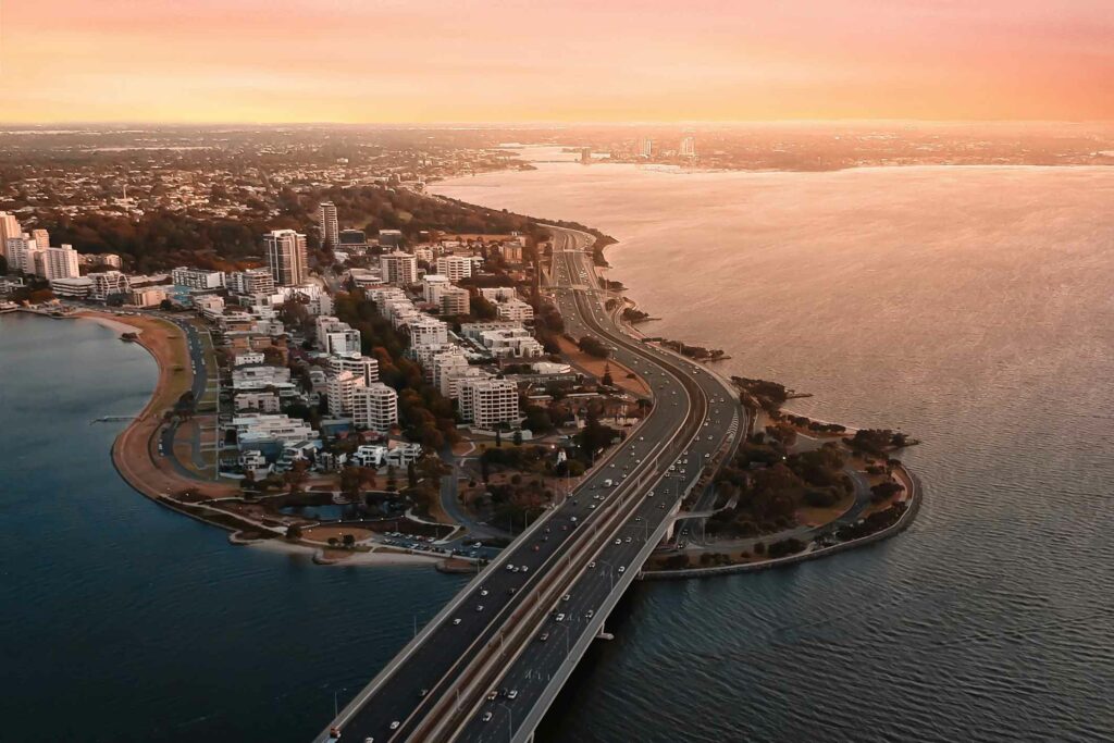 Aerial view of a Perth road at sunset